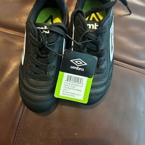 Umbro Black Soccer Cleats with Green Insole and White Accents